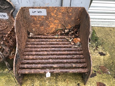 Lot 471 - A cast iron fire grate