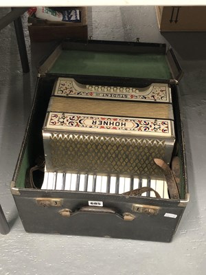 Lot 685 - A cased Hohner Student III piano accordian