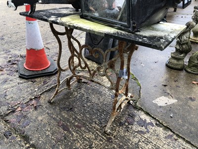 Lot 472 - A cast iron table frame/stand with a separate...