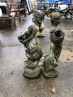 Lot 474 - A pair of concrete cast figures of a lady