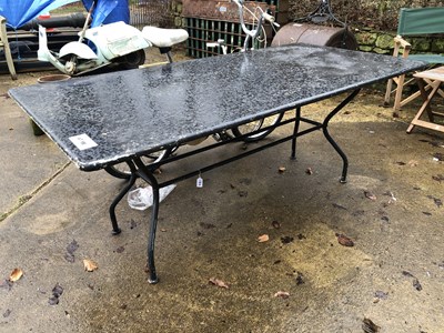 Lot 481 - A black metal garden table