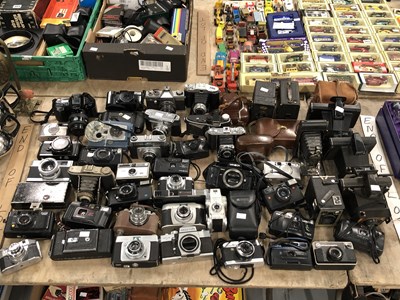 Lot 706 - A large collection of cameras by Minolta,...