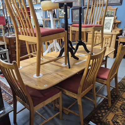Lot 103 - A modern Ercol elm dining table H 73 W 198 D...