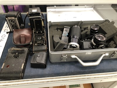 Lot 744 - A metal cased Nikon camera and lenses together...