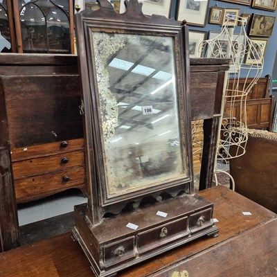Lot 106 - An 18th century mahogany swing mirror with...