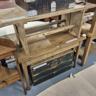 Lot 128 - A vintage pine table and a pair of pine long...