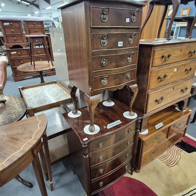 Lot 178 - Two small antique-style chests of four drawers...