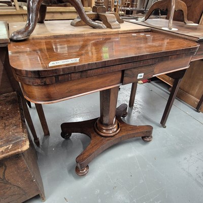 Lot 196 - A Victorian rosewood fold over games table H...