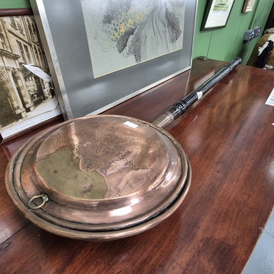 Lot 212 - A copper warming pan