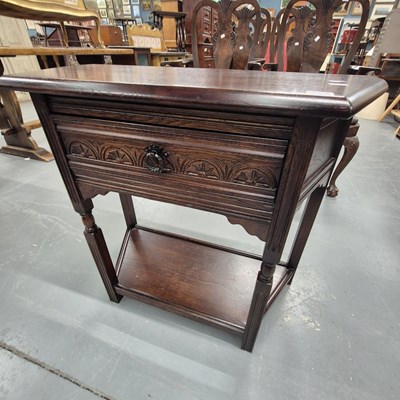 Lot 224 - An oak hall table