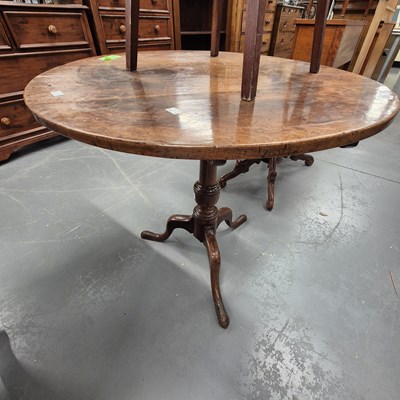 Lot 228 - A 19th century mahogany tripod table