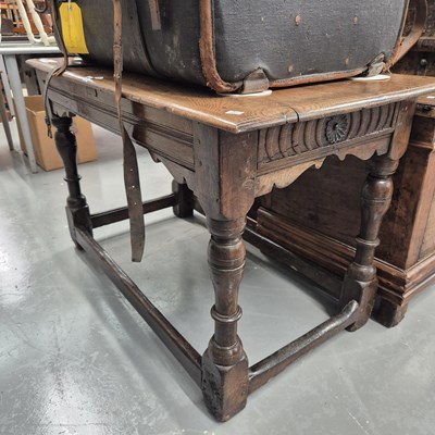 Lot 251 - A 19th-century oak side table H 74cm W 118cm D...