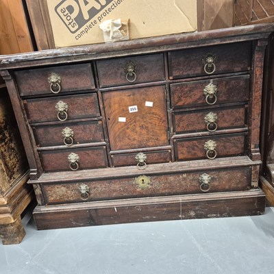 Lot 255 - An 18th century burr walnut nest of eleven...