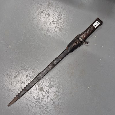Lot 755 - An antique bayonet in scabbard