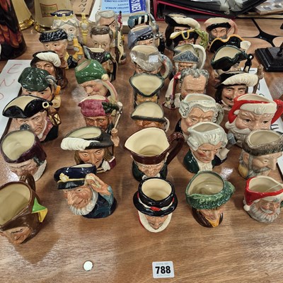 Lot 788 - A large collection of Doulton character jugs