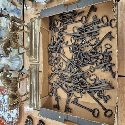 Lot 802 - A pair of antique brass horse fireside...