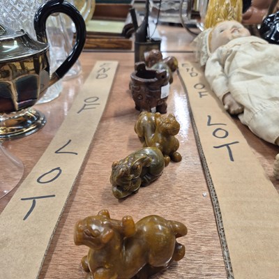 Lot 821 - Five oriental carved hardstone figures and an...