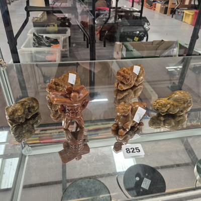 Lot 825 - Six oriental carved hardstone figures.