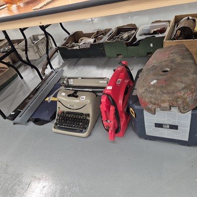 Lot 844 - A typewriter, toolbox, battery charger, a...