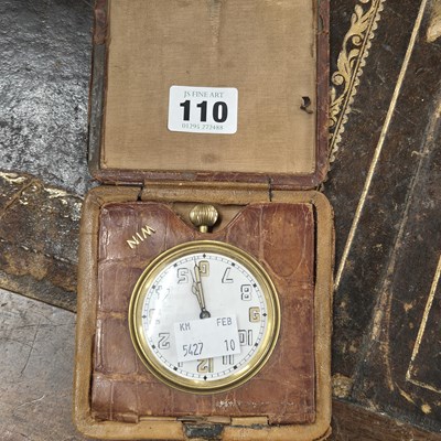 Lot 1110 - An early 20th century travelling clock /watch...