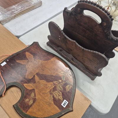 Lot 883 - A penwork decorated panel and a magazine rack