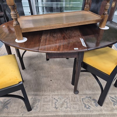 Lot 493 - A George III mahogany drop leaf gateleg supper...