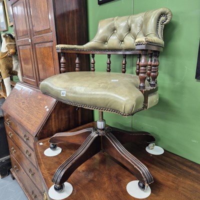 Lot 267 - A swivel office chair