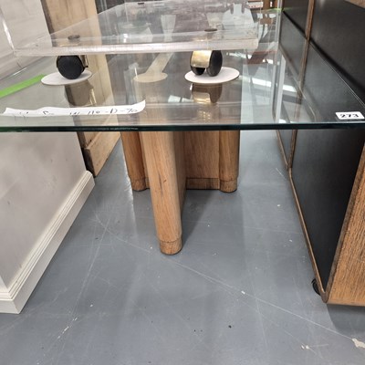 Lot 273 - An interesting glass coffee table on a shaped...