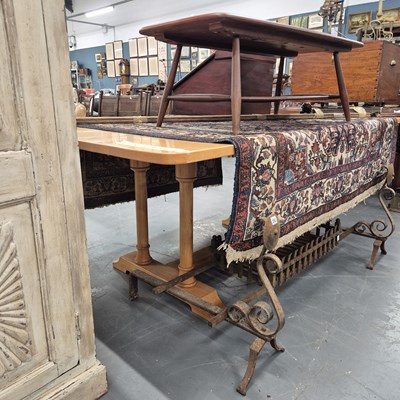 Lot 280 - A large maple dining table on double column...