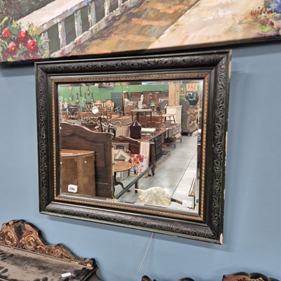 Lot 296 - An antique wall mirror