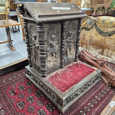 Lot 307 - A carved oak prayer stand with 17th-century...