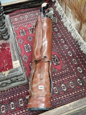 Lot 308 - A bag of vintage golf clubs.