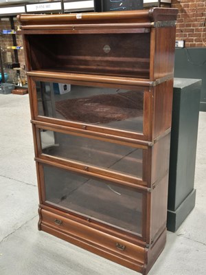 Lot 1120 - A glazed mahogany Globe Wernicke bookcase of...
