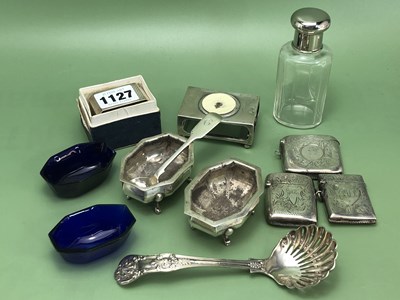 Lot 1127 - Three silver vestas, a match box sleeve, a...