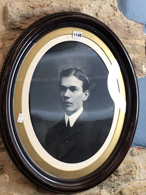 Lot 1148 - An oval photographic portrait morphing between...