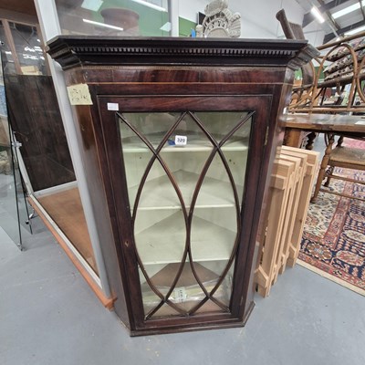 Lot 320 - A 19th century glazed corner cabinet