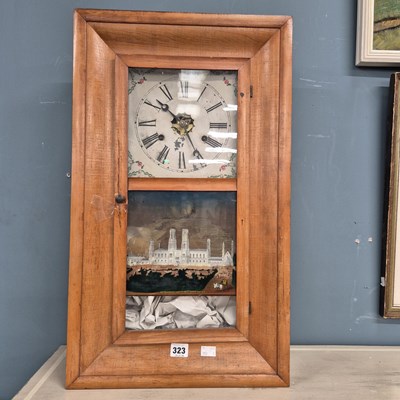 Lot 323 - An American ogee wall clock.