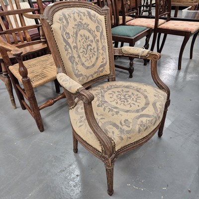 Lot 344 - A 19th centuy French show frame salon armchair
