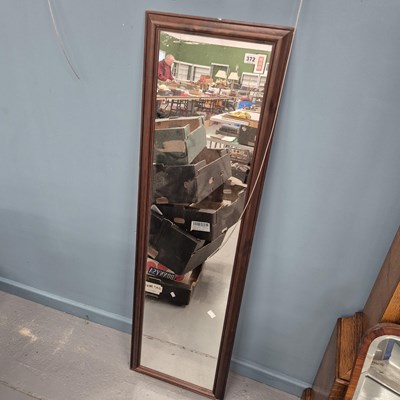 Lot 372 - A tall wall mirror