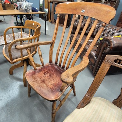 Lot 382 - A Victorian slat back kitchen armchair