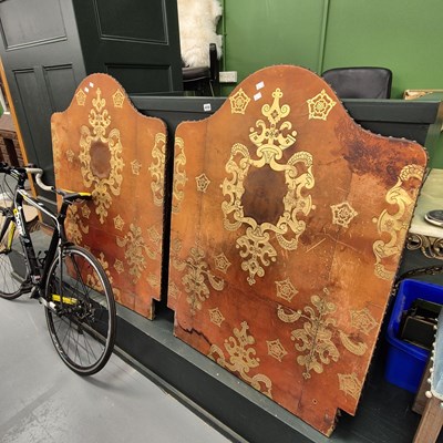 Lot 410 - A pair of tooled leather headboards. H 115.5 W...