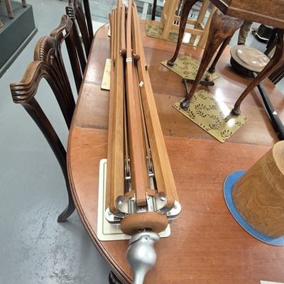 Lot 404 - A wooden framed  fabric parasol