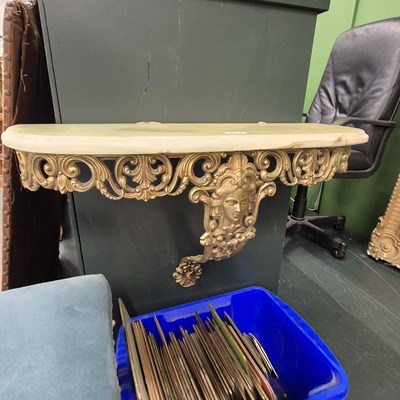 Lot 411 - A gilt brass and marble console table