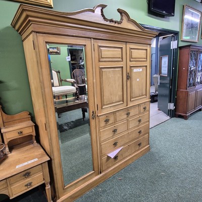 Lot 434 - A Victorian ash triple compactum wardrobe by...