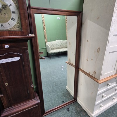 Lot 438 - A large wall mirror