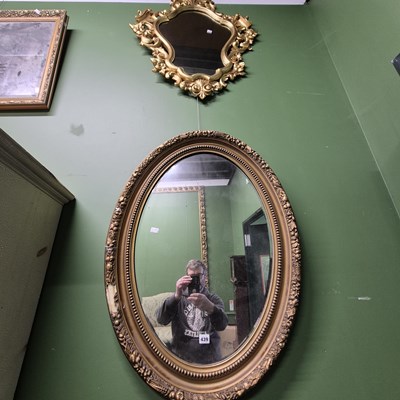 Lot 439 - An 18th-century style Florentine gilt wall...