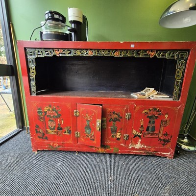 Lot 445 - A large Chinese red lacquer decorated side...