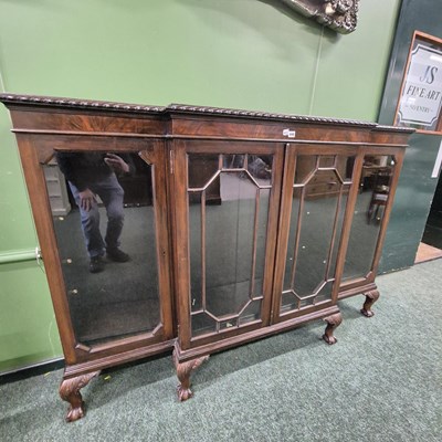 Lot 448 - An Edwardian mahogany breakfront dwarf...