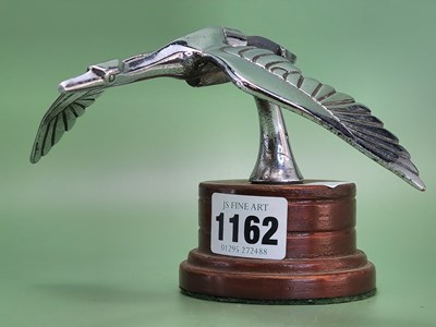 Lot 1162 - A chrome car mascot modelled as a swan in...