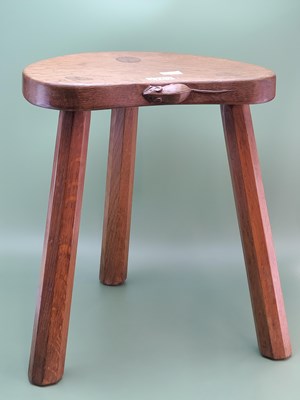 Lot 1169 - A Robert Thompson 'Mouseman' oak stool, the...